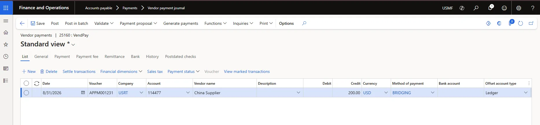 Vendor payment journal line for company USRT, vendor 114477, using the BRIDGING method of payment with bank account USMF OPER